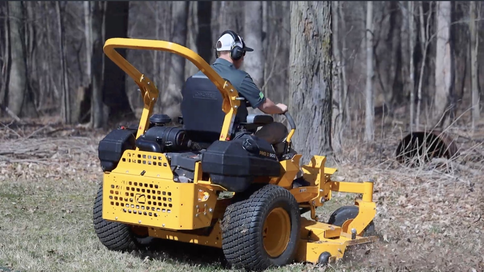 Commercial-grade zero-turn mower at work in West Michigan